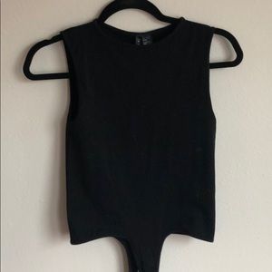 High neck body suit.